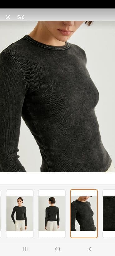 Qara, uzunqol, rezinli materialdan hazırlanmış qadın köynəyi. Dəyirmi