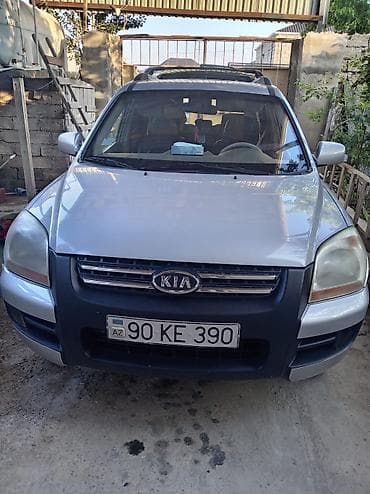 opel astra xectbek: Kia Sportage: 2 l | 2004 il Sedan — 1