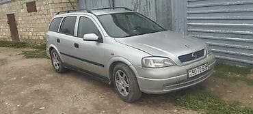 masin 09: Opel Astra Caravan (Universal) – gümüş rəng Xarici: - Universal — 2