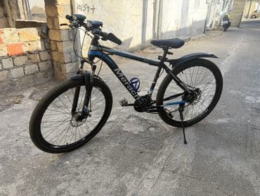 asma mühərrikli velosiped nədir: 29 olculu Merach dağ velosipedi, qara rəngdə və mavi detallarla — 2