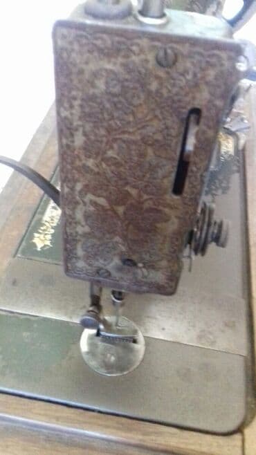 qədimi qəpiklər: Singer tikiş maşını.1904 -cü il ictehsalı.Üstündə seriya nömrəsi — 5
