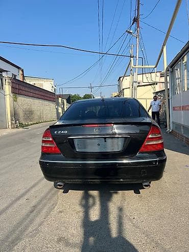daewoo lanos 2011: Mercedes-Benz E 240: 2.4 l | 2002 il Sedan — 5