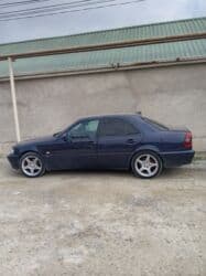 mercedes yeni logo: Mercedes-Benz C240 (W202) sedan - Kuzov: 4 qapılı sedan, tünd mavi — 10