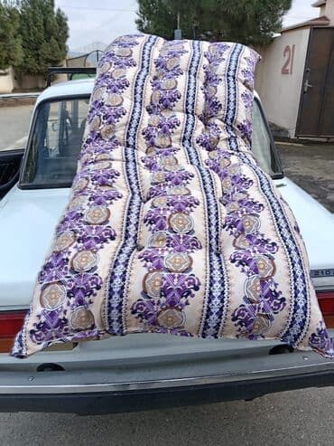 Balış üzləri: Təzə yun doşəklər. 1 nəfərlik doşək 40 manat. 2 nəfərlik taxt doşək — 1