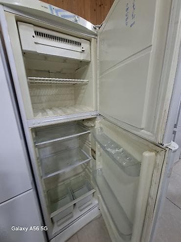 hell soyuducu: Indesit iki qapılı soyuducu - Üst qapıda dondurucu bölmə, alt qapıda — 2