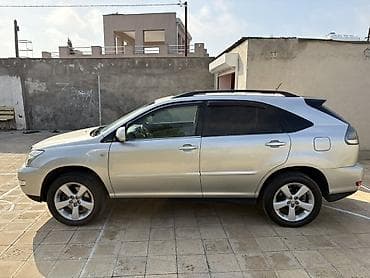 mazda 3: Lexus RX: 3.3 l | 2004 il Krossover — 5