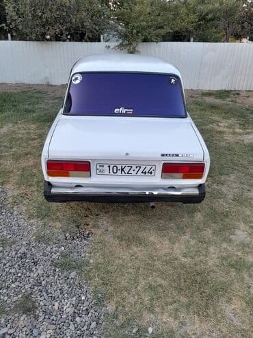 опель зафира а: Lada 2107 sedan – ağ rəng Xüsusiyyətlər: - Kuzov: 4 qapılı sedan, ağ — 4