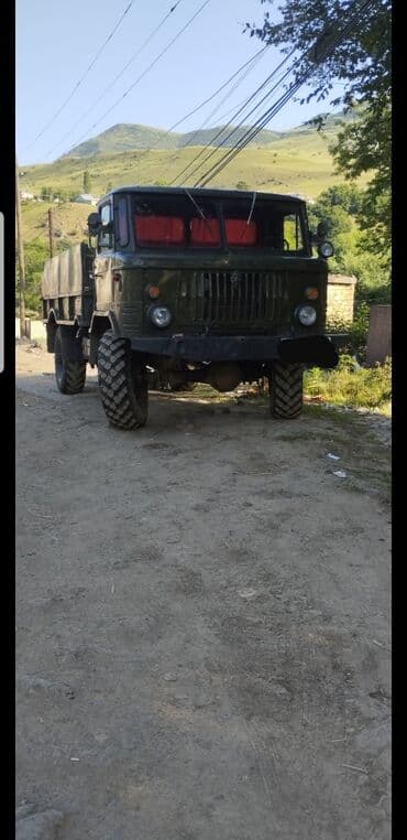 yeni teker kreditle type 1: Yük maşını – hərbi tərzdə, 4x4 (tam ötürücülü) bortlu yük platforması — 3