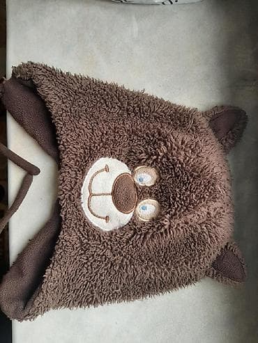 Üst geyimləri: Qalın qış üçün papaq satilir 2-3yaş üçündür.cox rahat ve istidir — 1