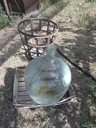 Şüşə qab 50 lt,dəmir səbəti ilə birlikdə satılır 35 m,şərəb və ya — 2