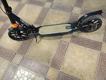 Şəhər içi rahat hərəkət üçün yığcam skuter - Mexaniki (ayaqla