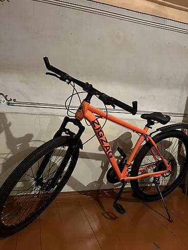 İdman və istirahət: Zigzag dağ/şəhər velosipedi - Rəng: parlaq narıncı, qara detallarla - — 1