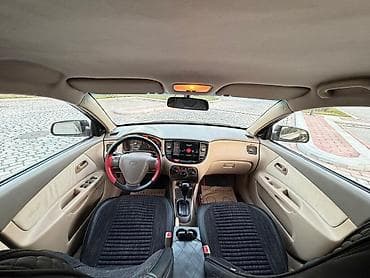 sam diski: Kia Rio: 1.4 l | 2008 il Sedan — 9