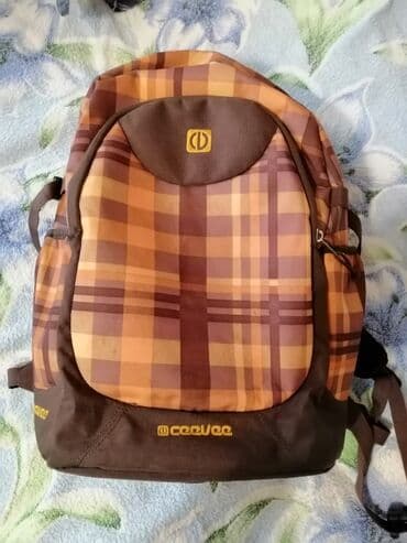 qruz nə deməkdir: Şəhər istifadəsi üçün nəzərdə tutulmuş bu uniseks bel çantası qəhvəyi — 2