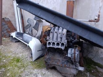 mtz 892 qiymeti: Mitsubishi Pajero IO – ağ rəngli, 5 qapılı kompakt SUV Maşının ancaq — 6