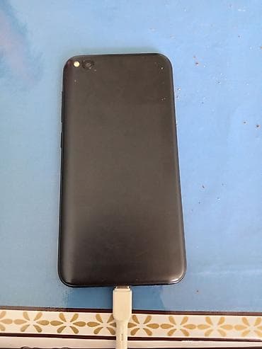 canon eos 2000d qiymeti: Redmi 4A, 16 GB, rəng - Qara, İki sim kartlı — 2