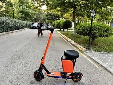 qab qaşiq: Elektrik skuter – oturacaqlı, portativ və şəhər içi gedişlər üçün — 1
