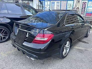 mercedes e280: Mercedes-Benz C‑Class sedan (W204) – qara rəng, AMG paketli görünüş — 4