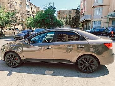 mini cooper kreditle: Kia Cerato: 1.6 l | 2011 il Sedan — 2