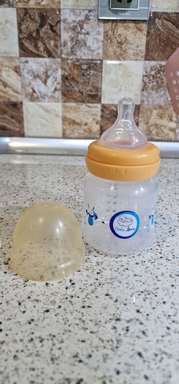 qurd agiz usaqlar ucun butulkalar: Uşağ butulkasi. 150 ml - dir. Təzə kimidir. Baby love firmasinindir — 2