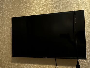 televizoru divardan asmaq: İşlənmiş Televizor Hoffmann LED ekran 32" Ünvandan götürmə — 1