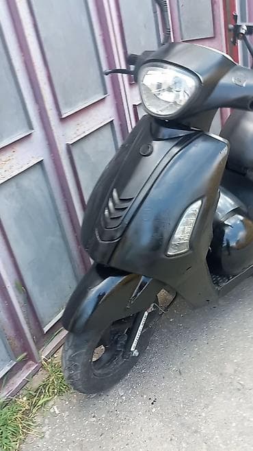 moto kasqa: Skuter – şəhər içi rahat hərəkət üçün kompakt və qənaətcil model — 7
