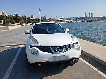 damas masin: Nissan Juke – kompakt krossover, ağ rəng. Şəhər üçün çevik ölçü və — 3