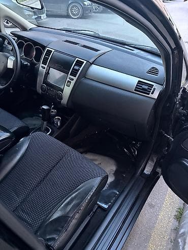 disk teker 14: Nissan Tiida: 1.6 l | 2012 il Sedan — 4
