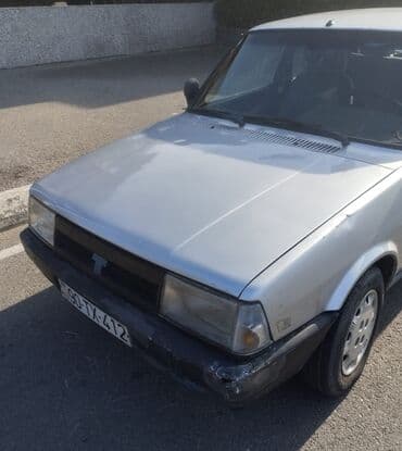 tofaş satış: Tofaş Şahin/Doğan (sedan) – gümüşü rəng Xüsusiyyətlər: - Kuzov: 4 — 4