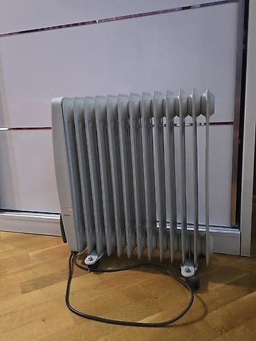 yag qizdirici: Yağ ilə işləyən elektrik radiatoru 12 bölməli, Yaponiya istehsalı — 1