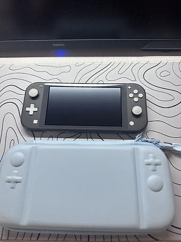 nini: Satılır: Nintendo Switch Lite (İdeal vəziyyətdə) Nintendo Switch Lite — 5