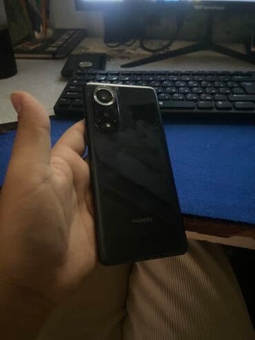 телефон fly 521: Huawei Nova 9, цвет - Черный, Две SIM карты — 2