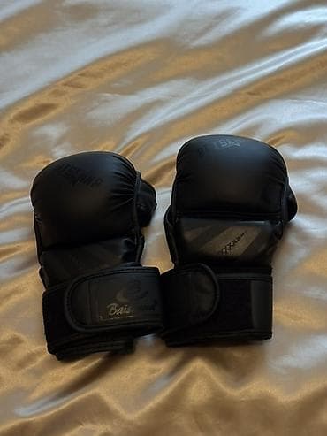 Məhsul: Boks/MMA məşq əlcəkləri – qara rəng Xüsusiyyətlər: - Dizayn