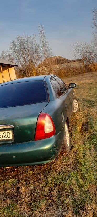 Скупка авто: Model: Daewoo Nubira (sedan) Rəng: Tünd yaşıl Yanacaq növü: Benzin — 6