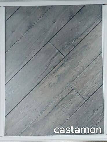 laminat satış mərkəzi: Taxta görünüşlü, boz rəngli laminat döşəmə örtüyü. Otaqlara müasir və — 2