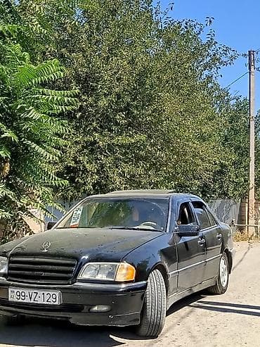 su radiatoru mersedes: Mercedes-Benz C 230: 2.3 l | 2000 il Sedan — 2