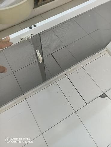 Qapı setka aliminum çərçivə daxilində. Uzunluğu 216sm eni 96 sm normal — 2