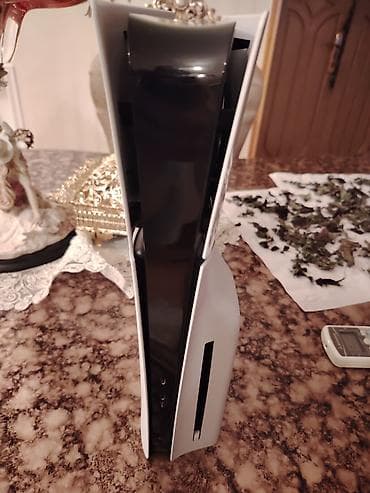 the order: Ps 5 slim satılır 2 djostik ilə, ideal vəziyyətdədir, içinde 600 — 3