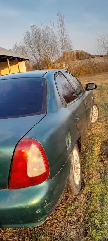 Скупка авто: Model: Daewoo Nubira (sedan) Rəng: Tünd yaşıl Yanacaq növü: Benzin — 8