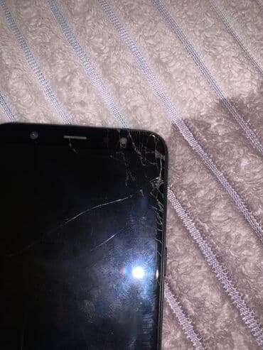 mi 12 t: Smartfon – qara rəngli, nazik korpus. Xüsusiyyətlər: - Sensorlu ekran — 6