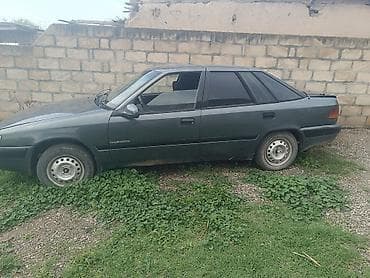 daewoo satis merkezi: Daewoo Nexia sedan - Kuzov: 4 qapılı sedan, tünd boz rəng - Yan — 1