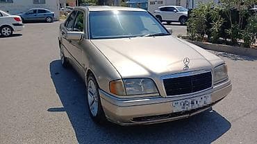 audi a6 c5: Mercedes-Benz C-Class: 2.2 l | 1994 il Sedan — 3