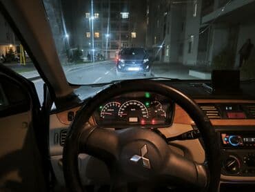 e 124: Mitsubishi Lancer: 1.6 l | 2006 il 34000 km Sedan — 4