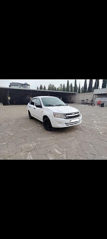 volkswagen passat b6: VAZ (LADA) Granta: 1.6 l | 2012 il 310000 km Sedan — 1