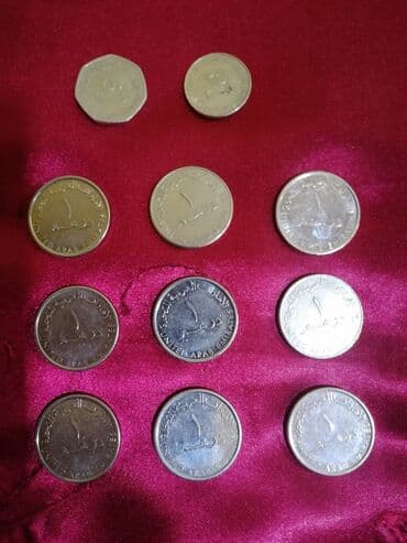 1 manat nece rubl: Məhsul: BƏƏ (United Arab Emirates) sikkələri dəsti Tərkib: - 10 ədəd — 1