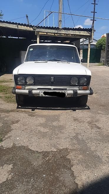 mator 80cc vəlo: VAZ 2106, ağ rəngli sedan. Texniki xüsusiyyətlər: - Kuzov: sedan — 4