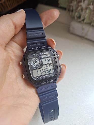 casio g: Casio G-Shock rəqəmsal qol saatı - Model: Casio G‑Shock (arxa qapaqda — 4