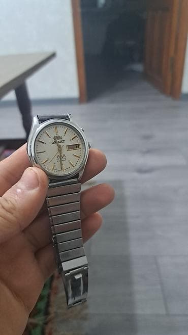 saat seiko: İşlənmiş, Qol saatı, Orient, rəng - Gümüşü — 3