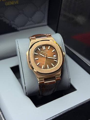 Patek Philippe Nautilus avtomatik kişi qol saatı - Korpus: qızılı