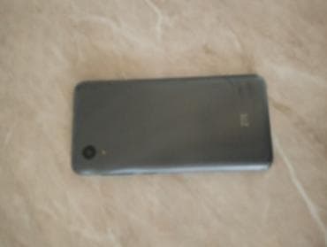 philips xenium 9@9h: ZTE 32 GB, rəng - Qara, Qırıq — 2